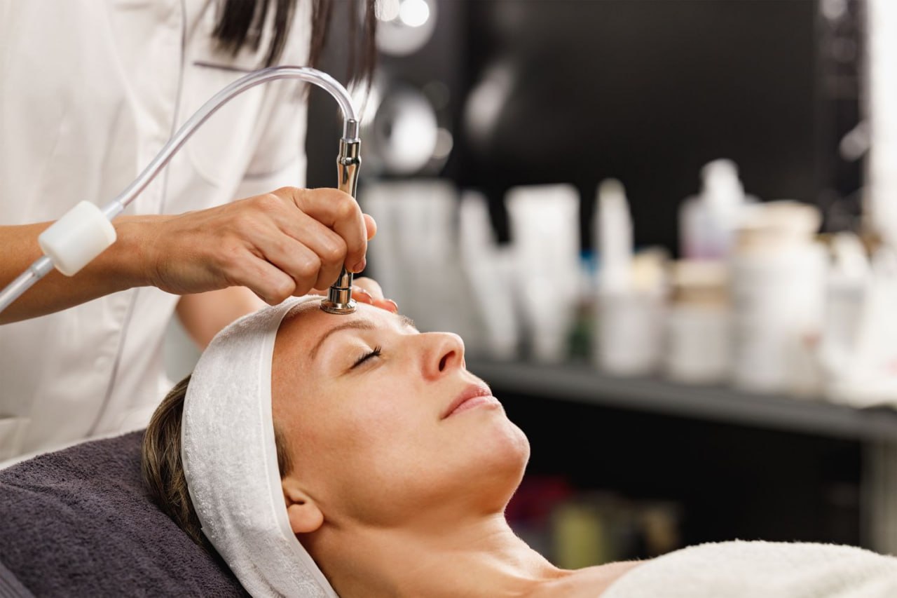 Professional microdermabrasion treatment in progress